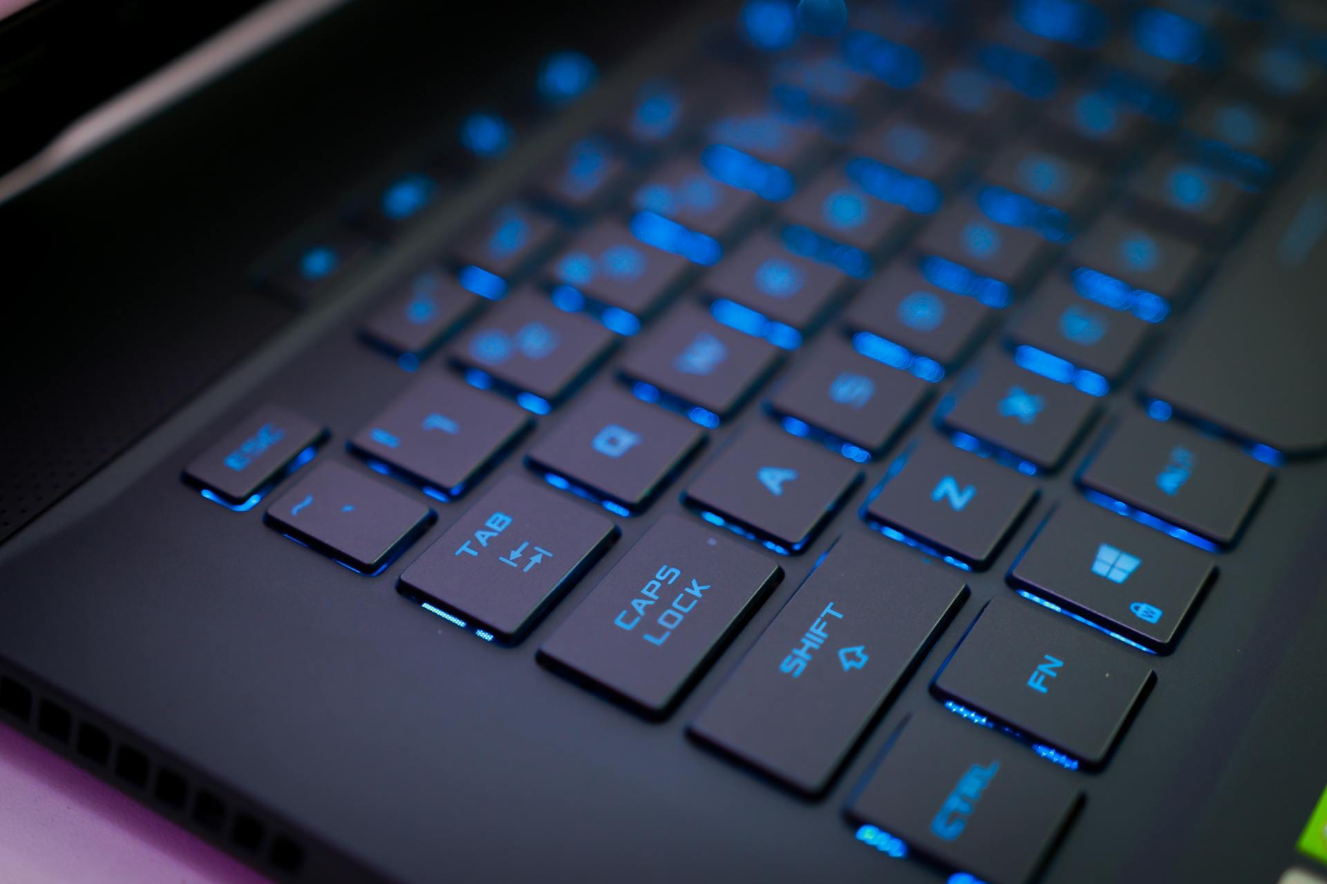 Backlit keyboard representing marketing-first website design for Utah businesses